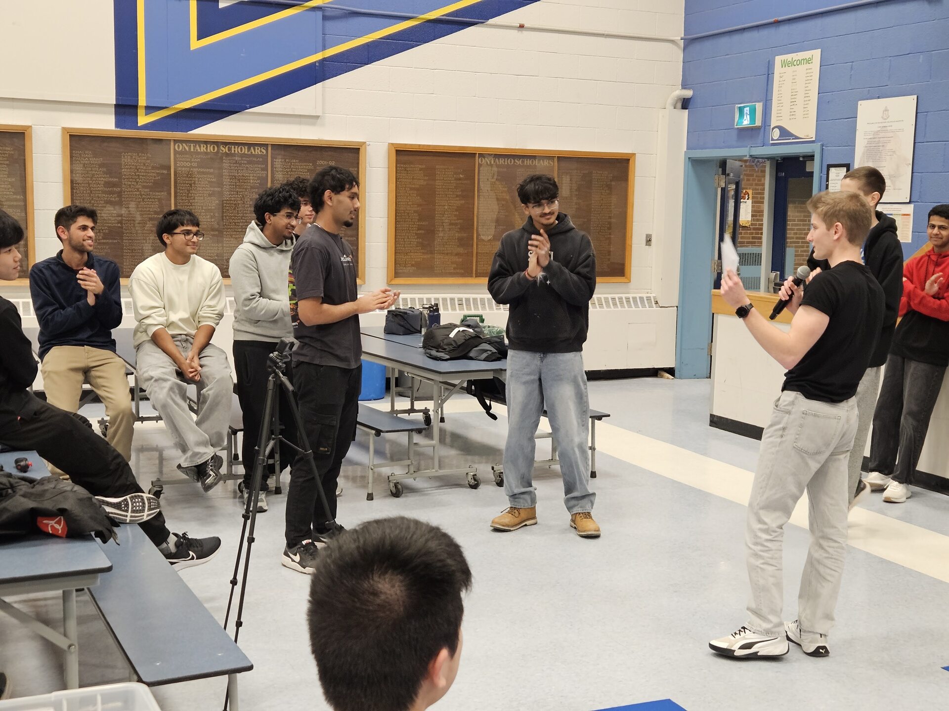 Anthony presenting a prize as the event MC